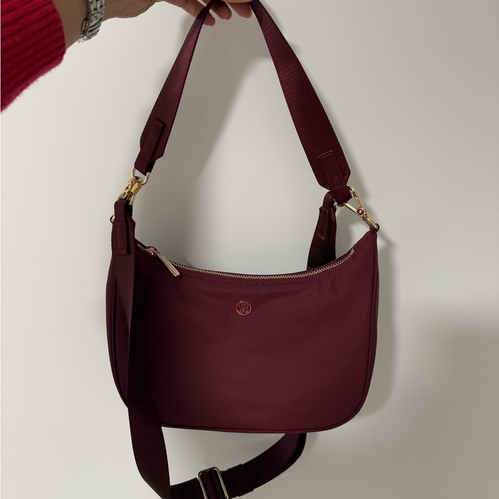 Lululemon burgundy crossbody bag